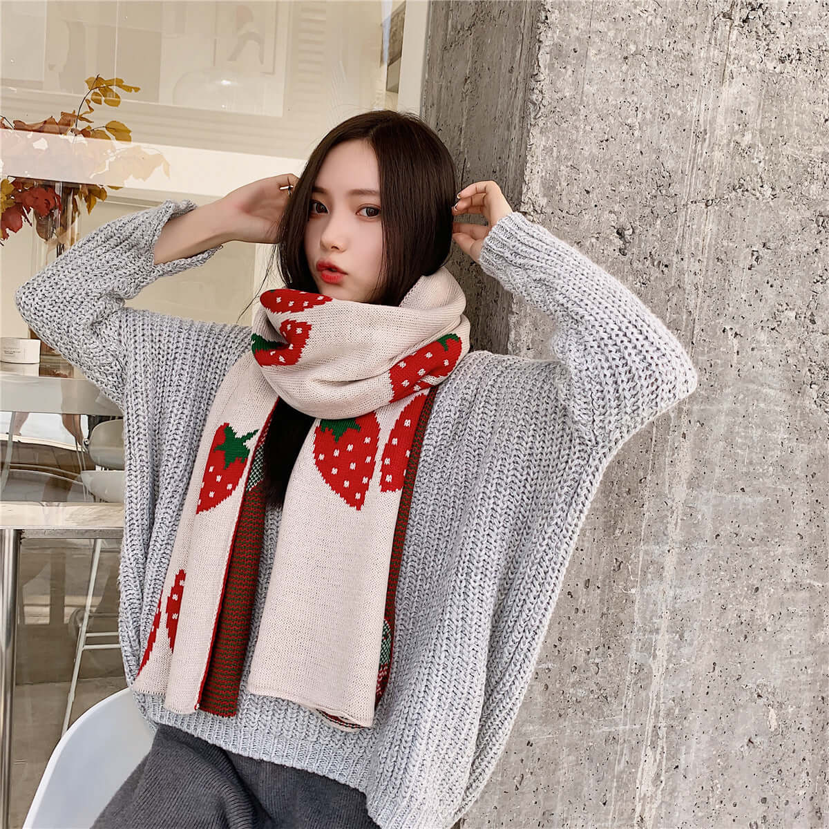 Long strawberry knitted scarf